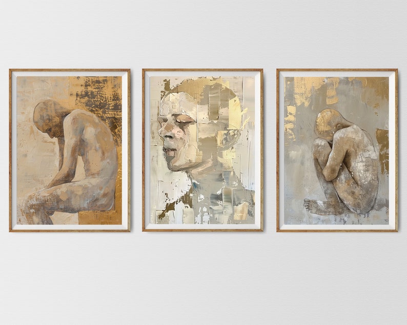 May include: Three framed paintings with a gold background and a nude figure in each. The figures are in different poses, one is sitting, one is standing, and one is curled up.