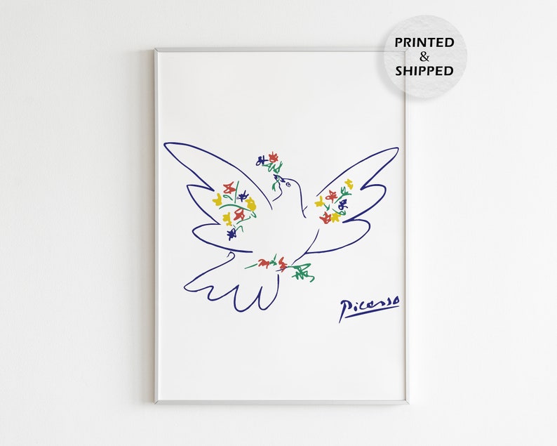 May include: A blue line drawing of a dove with a wreath of colorful flowers around its neck. The dove is facing left and has its wings spread. The drawing is signed "Picasso" in blue ink.