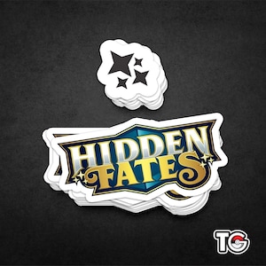 May include: A stack of white stickers with a blue and gold logo that says "HIDDEN FATES" and a smaller black sticker with four black stars.