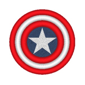 May include: A red, white, and blue circular patch with a white star in the center. The star is on a blue background, surrounded by a white ring, then a red ring, and finally a white ring.