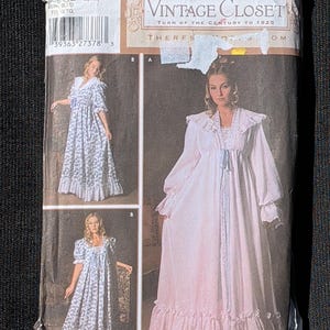 May include: A Simplicity Vintage Closet sewing pattern envelope 5188 for sizes L, XL. The package features illustrations of long, flowing robes with ruffled collars, long sleeves, and front ties, shown in both solid pink and a blue and white floral print.