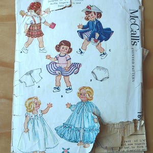 May include: A vintage McCall's sewing pattern for a doll's wardrobe. The pattern includes instructions for making a dress, a nightgown, a skirt, a hat, and underwear. The pattern is printed on a white background with black text and illustrations of dolls wearing the garments.