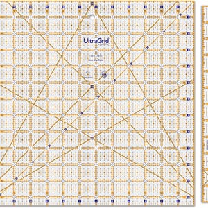 May include: A white 12 1/2 x 12 1/2 inch UltraGrid non-slip ruler with a grid pattern and diagonal lines. The ruler is made in the USA.