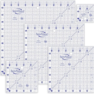 May include: Set of five clear plastic quilting rulers with blue markings and the text "SpinAbout" printed on each ruler. The rulers are in different sizes and have a grid pattern.