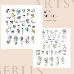 Könnte beinhalten: Eine Bogen mit Nagelaufklebern mit verschiedenen abstrakten Linienkunstdesigns mit Gesichtern, Schmetterlingen und Blumen. Die Aufkleber sind weiß mit schwarzen Linien und bunten Akzenten. Der Text "BEST SELLER" und "Pimp your nails" ist auf dem Bogen gedruckt. Der Text "YZW-3399" und "YZW-3397" ist ebenfalls auf dem Bogen gedruckt.