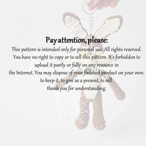 May include: A crocheted bunny keychain in shades of brown and cream, with long ears and a small tail. The image includes text that reads "Pay attention, please: This pattern is intended only for personal use."