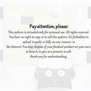 May include: A white, textured fabric with a rectangular pocket and rounded edges. The text "Pay attention, please:" is at the top, followed by usage instructions. A cartoon sheep is at the bottom.