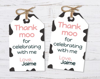 May include: Two white and black cow print gift tags with the text "Thank moo for celebrating with me Love, Jaime".