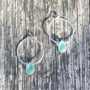 Handmade Sterling Silver hoop earrings with a green & blue glass water drop. Cute / Minimal / Sea Glass / Ocean / Beach / by Nui Jewellery