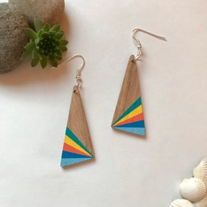 Handmade recycled wooden oak eco earrings, hand painted with a geometric multicoloured rainbow pattern by Nui Jewellery