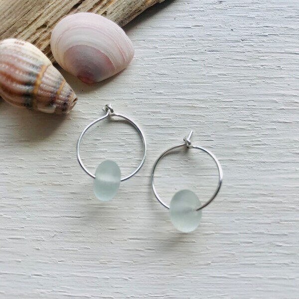 Handmade Sterling Silver hoop earrings, with eco recycled clear frosted glass beads / sea glass / beach / surf / ocean by Nui Jewellery