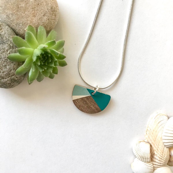 Handmade recycled black walnut wooden eco necklace, hand painted with a green geometric pattern. Natural / Earthy / Boho /  by Nui Jewellery