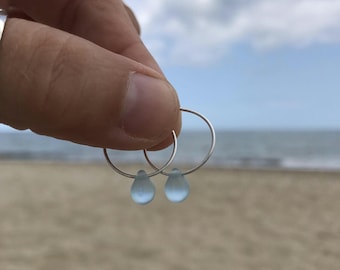Handmade Sterling Silver hoop earrings with a blue glass water drop bead. Cute / Minimal / Sea Glass / Ocean / Beach / by Nui Jewellery