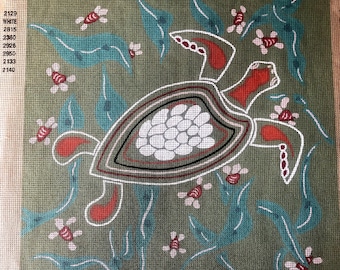 Tapiz estampado de la tortuga Penélope, de inspiración aborigen.