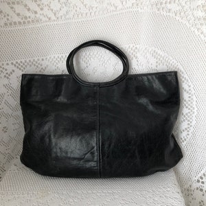 Vintage soft leather bag Nat et Nin bag Black aged look Women's flat handbag Tote bag Round handles Made in France Minimalist bag image 2