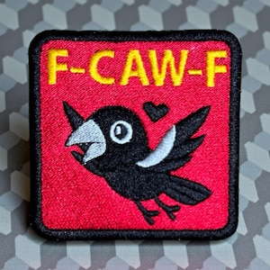May include: Embroidered patch with a black bird design on a red background. The bird has a white beak and wing accents, with the text "F-CAW-F" in yellow. A small black heart is above the bird.