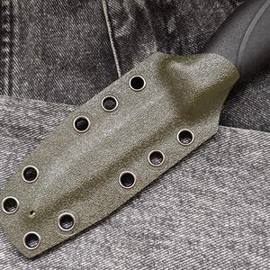 May include: A green leather knife sheath with metal eyelets. The sheath has a textured surface and is designed to fit a knife with a black handle.
