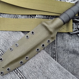 Kydex sheath. Glock 78/81 custom olive kydex sheath. Only the scabbard. Scabbard with attachment.