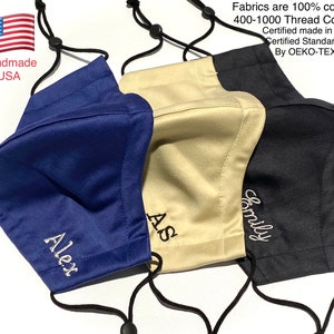 May include: Three face masks with adjustable straps. The masks are made of 100% cotton with a thread count of 400-1000. The masks are certified by OEKO-TEX. The masks are personalized with the names "Alex", "AS", and "Family".