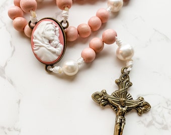 Catholic rosary with cameo Madonna of the Streets centerpiece, pink wood beads, natural pearl beads, and micro cord | Catholic gift