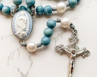 Catholic rosary with cameo Our Lady of Guadalupe centerpiece, blue wood beads, pearl beads, and micro cord | Catholic gift