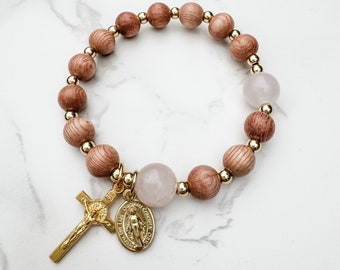 Catholic rosary stretch bracelet with gold tone crucifix and Miraculous medal, rosewood beads and rose quartz beads | Catholic gift