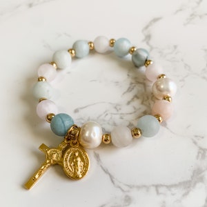 Catholic rosary stretch bracelet with gold tone crucifix and Miraculous medal, rose quartz, aquamarine, and pearls | Catholic gift