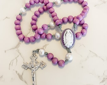 Catholic rosary with cameo Our Lady of Guadalupe centerpiece, purple wood beads, pearl beads, and micro cord | Catholic gift