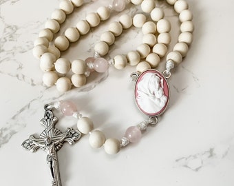 Catholic rosary with pink Madonna of the Streets cameo, white wood beads, rose quartz beads, and micro cord | Catholic gift