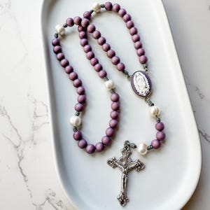 Catholic rosary beads with Our Lady of Guadalupe cameo centerpiece, purple wood beads, pearl beads, and micro cord | Catholic gift