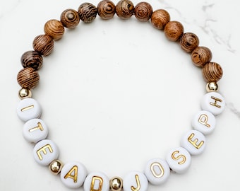 Ite Ad Joseph Catholic Friendship bracelet | Saint Joseph beaded bracelet with wood beads and gold accents | Catholic jewelry for her