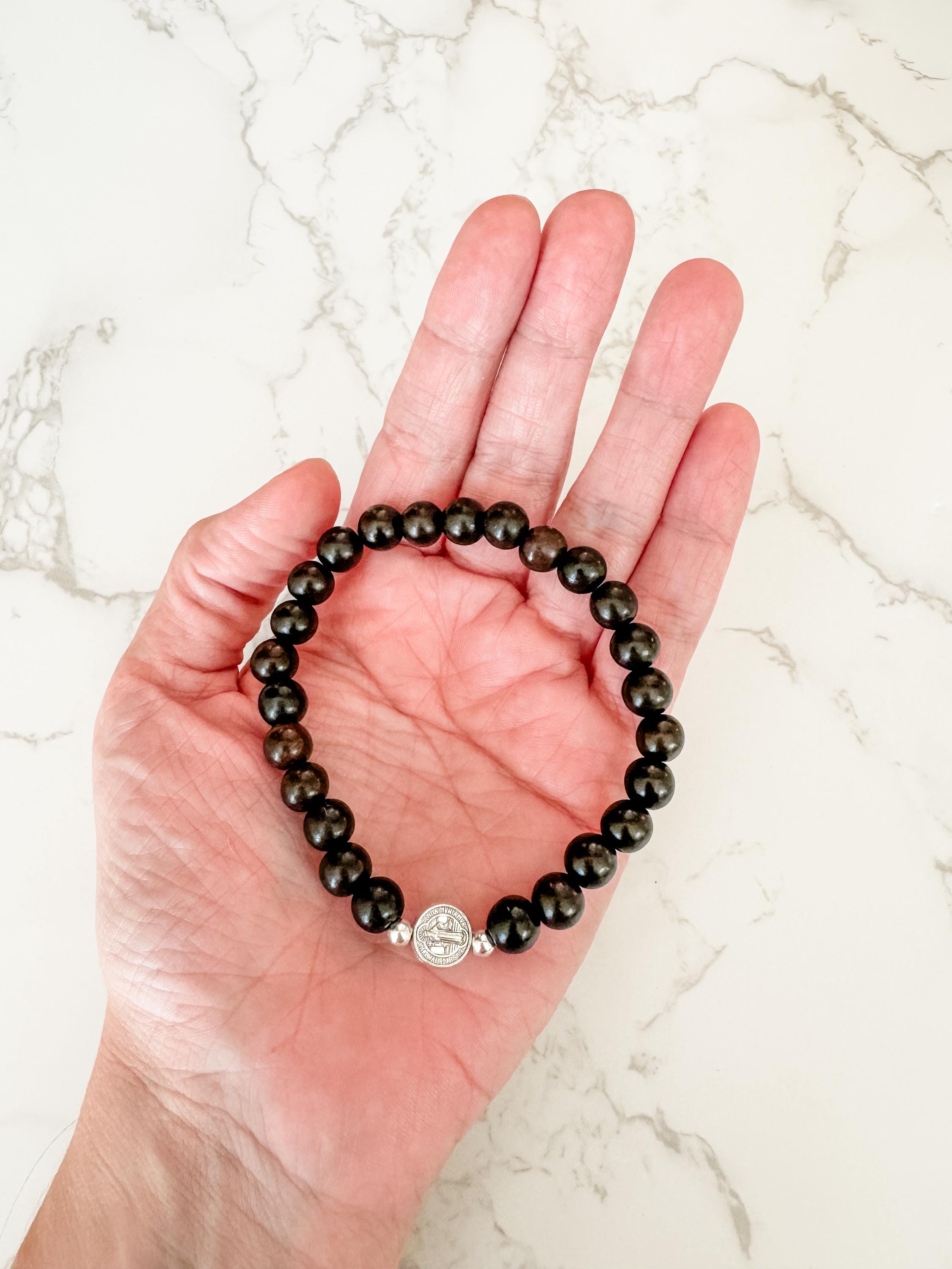 Catholic Stretch Bracelet Made With Ebony Wood Beads and a Saint