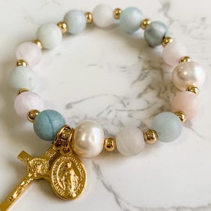 Catholic rosary stretch bracelet with gold tone crucifix and Miraculous medal, rose quartz, aquamarine, and pearls | Catholic gift
