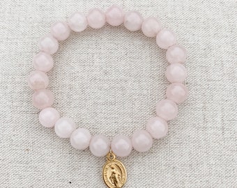 Catholic stretch bracelet made with pink quartz, stretch cord, and a tiny gold-tone Miraculous Medal | Catholic bracelet | Catholic gift