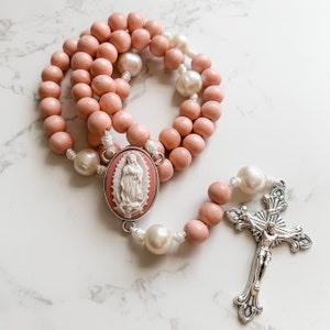 Our Lady of Guadalupe Cameo centerpiece rosary by Refuge Rosaries with pink wood and pearl beads with micro cord | Catholic gift | Paracord