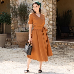 black formal dresses Valema Resort Flowy Short Sleeve Floral Lace Midi Dress by Bella Barnett