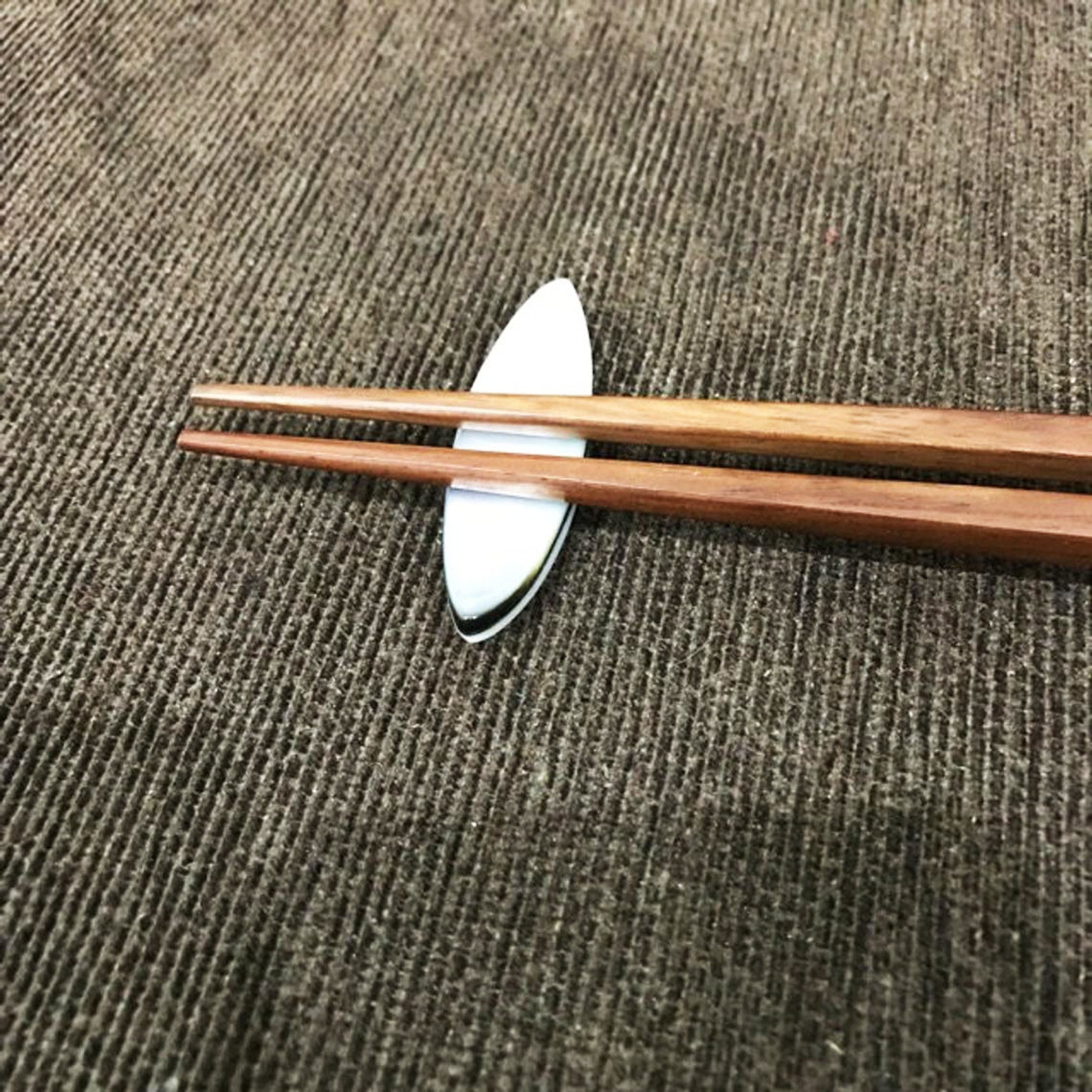Set Of Five Ceramic Chopstick Rests With Chopsticks