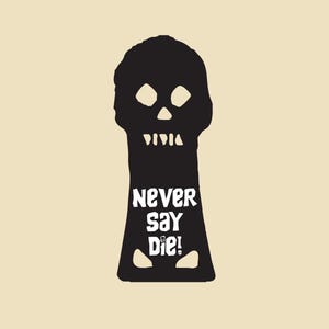 May include: A black silhouette of a skull-shaped keyhole on a light beige background. The design features the text NEVER SAY DIE! in white capital letters within the center of the black shape, with stylized eye and mouth cutouts above the text.