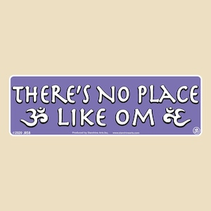 May include: Purple sticker with white text that reads "There's no place like Om" with the Om symbol on either side of the word "Om".
