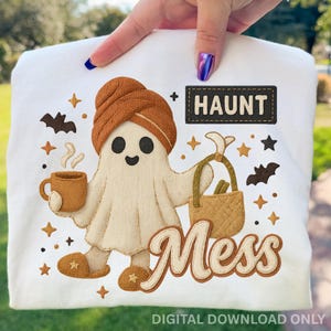 May include: White sweatshirt featuring a cartoon ghost with a brown turban, holding a coffee mug and a basket. The text "HAUNT Mess" is displayed with stars and bats. "DIGITAL DOWNLOAD ONLY" is printed at the bottom.