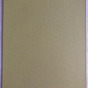 May include: A solid, light brown, textured card stock with a subtle, slightly rough surface.