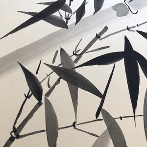 May include: Black and white ink painting of bamboo leaves and branches. The painting is done in a traditional Japanese style.