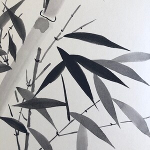 May include: Black and white ink painting of bamboo stalks and leaves. The painting is done in a traditional Japanese style.
