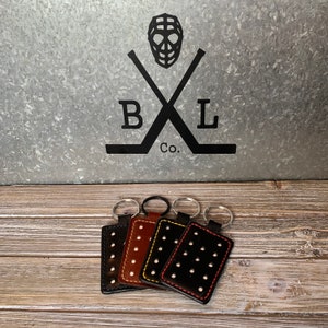 Leather keychain, key fob, goalie blocker.