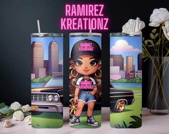 May include: Three stainless steel tumblers with a cartoon illustration of a girl wearing a baseball cap and a denim skirt. The girl is standing in front of a black car with a city skyline in the background. The tumblers are labeled "Ramirez Kreationz".