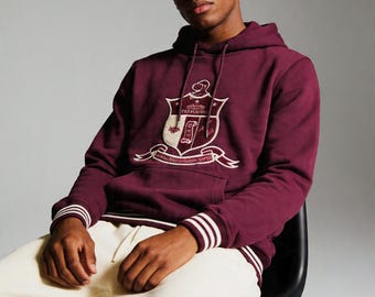 Sudadera con capucha con el escudo de armas de Kappa Alpha Psi House Cream