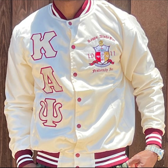 Gold kappa alpha top psi bomber jacket