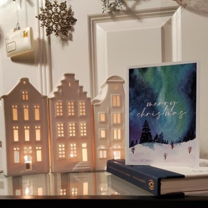 Kerstkaart van het noorderlicht