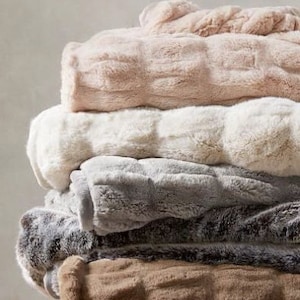 Lot - 2 Rabbit pelt blankets. Each “blanket” is made up of 12