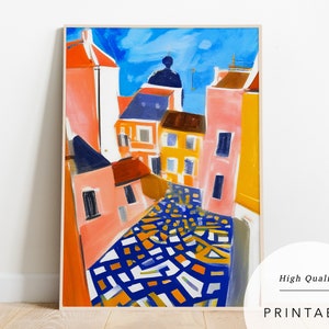 May include: A colourful abstract painting of a city street with buildings in shades of pink, yellow, blue, and orange. The street is paved with a geometric pattern of blue, yellow, and white.